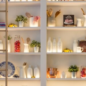 white ceramic bottles on shelf